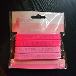 New! 4 pack rubber Breast Cancer Awareness Bracelets.